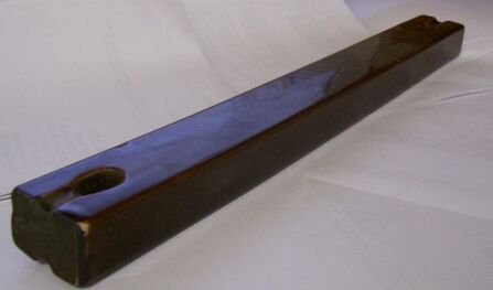 14 inch brown ceramic insulator with holes