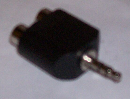 Dual RCAF TO 3.5 Stereo Plug on a White Surface