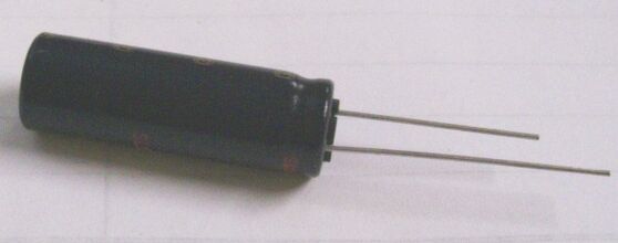 Capacitor, 220uf at 63V on a White Background
