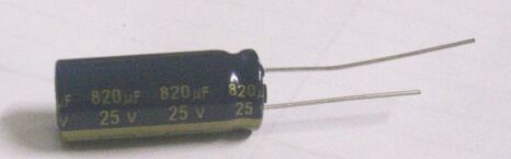 Capacitor, 820 uF 25V on a White Background