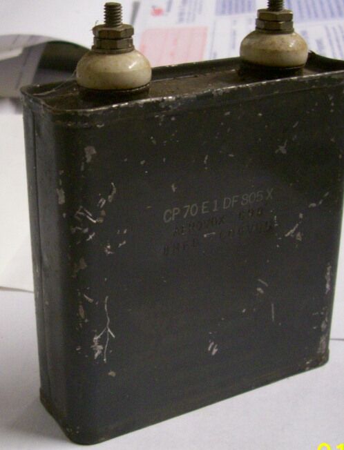 Oil based Capacitor on a White Background Thirteen