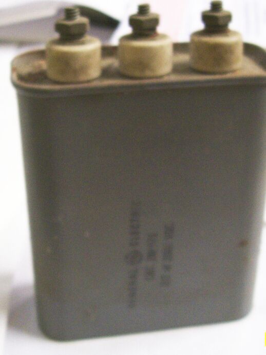 Oil based Capacitor on a White Background Ten