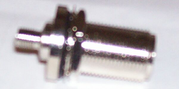 Bulkhead NF adapter on white background